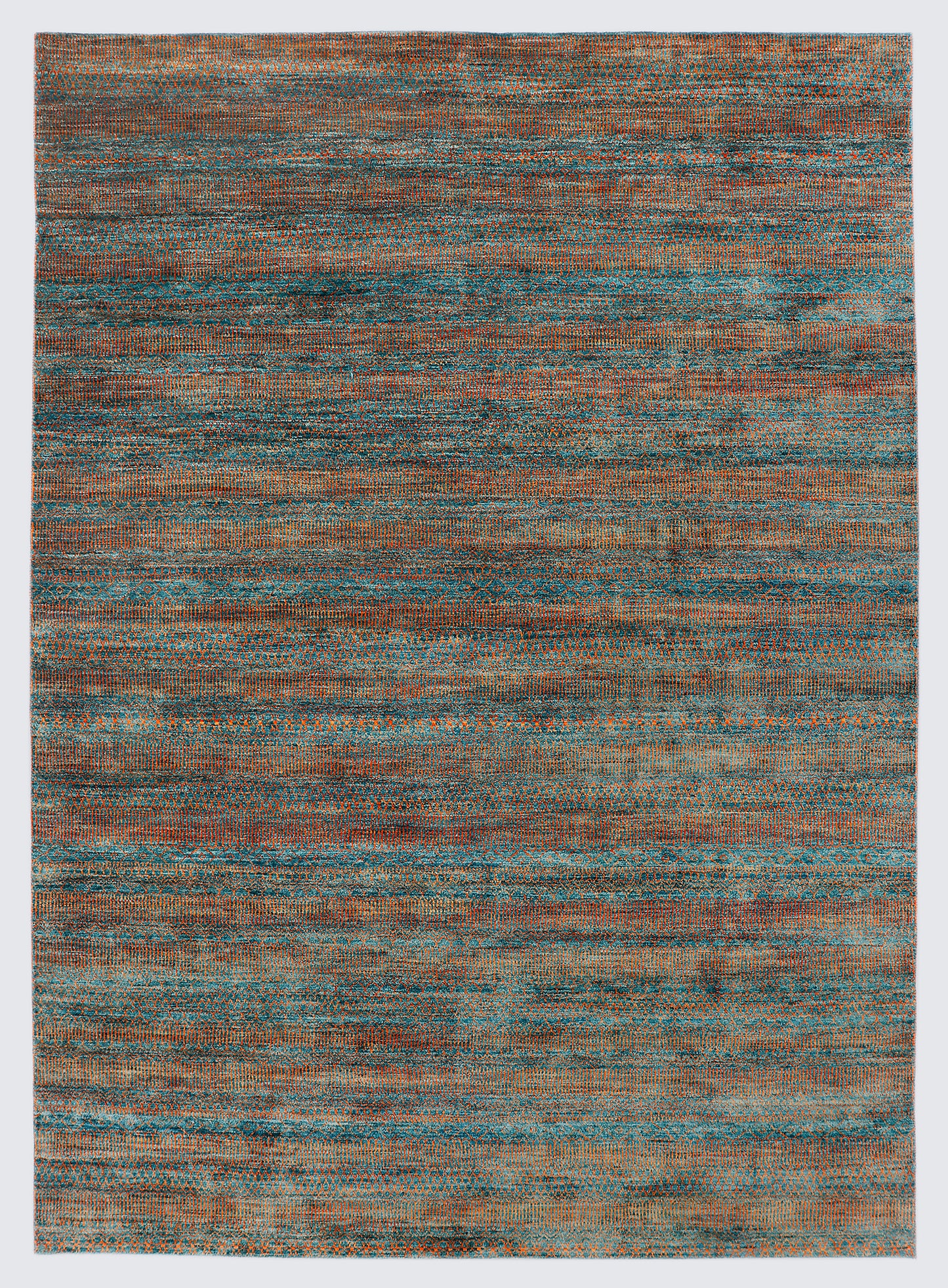 A full view of a vibrant hand-knotted double-knot Gabbeh rug from the Aatish collection, featuring horizontal bands of variegated orange tribal motifs over a textured malachite blue-green foundation.