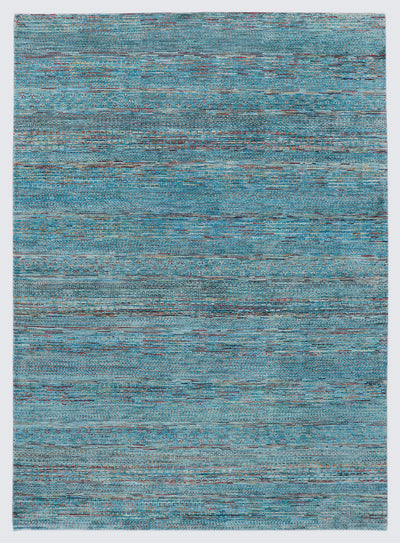 A full view of a vibrant hand-knotted Gabbeh rug from the Aatish collection, featuring horizontal bands of saffron and ivory tribal motifs over a striated sea blue-green foundation.
