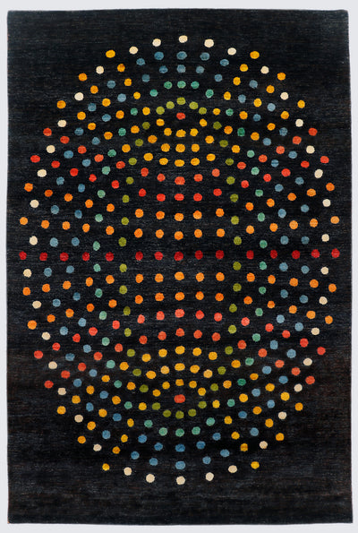 A full view of a modern abstract hand-knotted rug from the Fresco Edit, featuring a large, spherical arrangement of vibrant, multi-colored dots set against a solid deep black background.