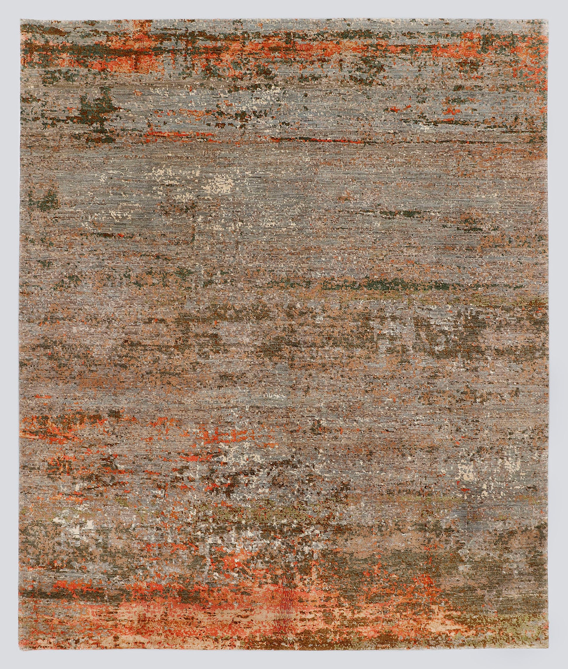 A full view of a pure abstract hand-knotted rug from the Fresco Edit, featuring horizontal layers of slate grey, olive, and vibrant rust woven in a wool and hybrid silk blend.