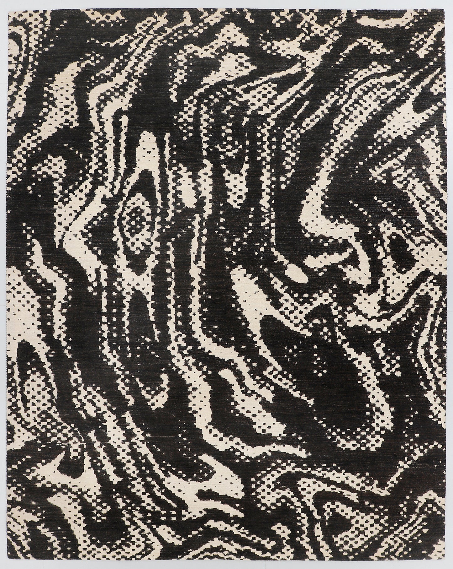 A full view of an original black and white abstract rug from the Fresco Edit, featuring highly kinetic, swirling expressionist lines and stippled patterns inspired by the painting "The Scream."