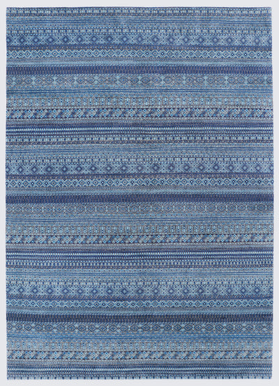 A full view of a hand-knotted wool rug featuring dense horizontal bands of miniature tribal motifs in a calming monochromatic palette of indigo, steel blue, and soft azure.