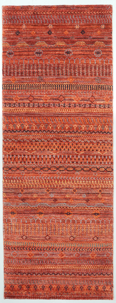 Full view of a Madder Rust deep red hand-knotted Aatish rug featuring rhythmic Tarh motifs.