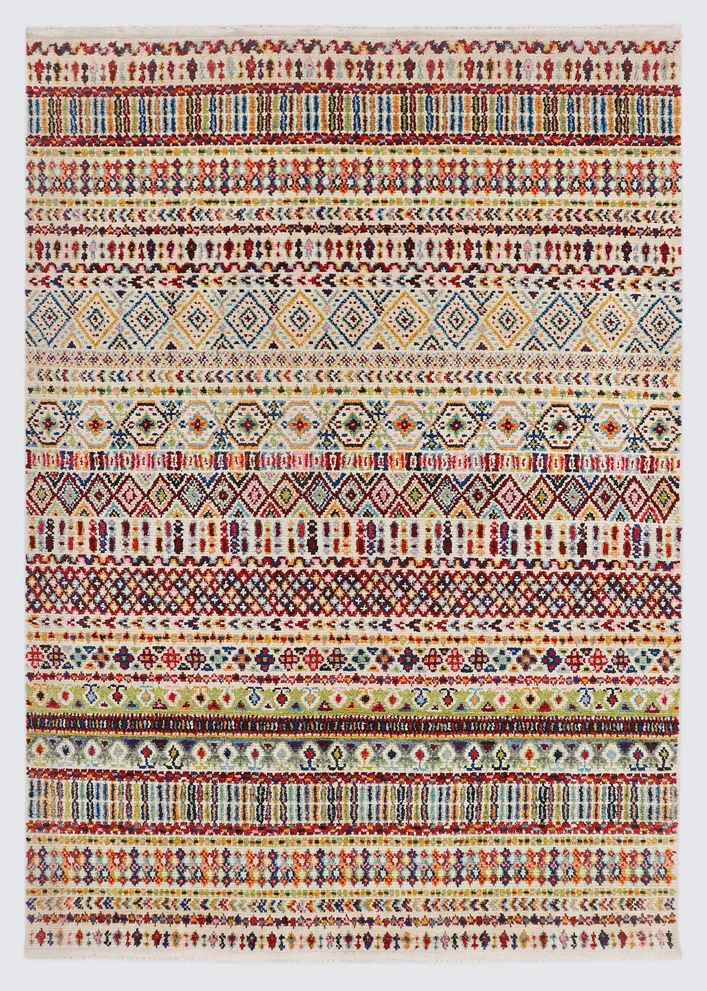 A full view of a vibrant, hand-knotted rug from Pakistan featuring dense, horizontal stripes of intricate geometric tribal motifs in rich jewel tones of ruby red, indigo blue, and saffron yellow.