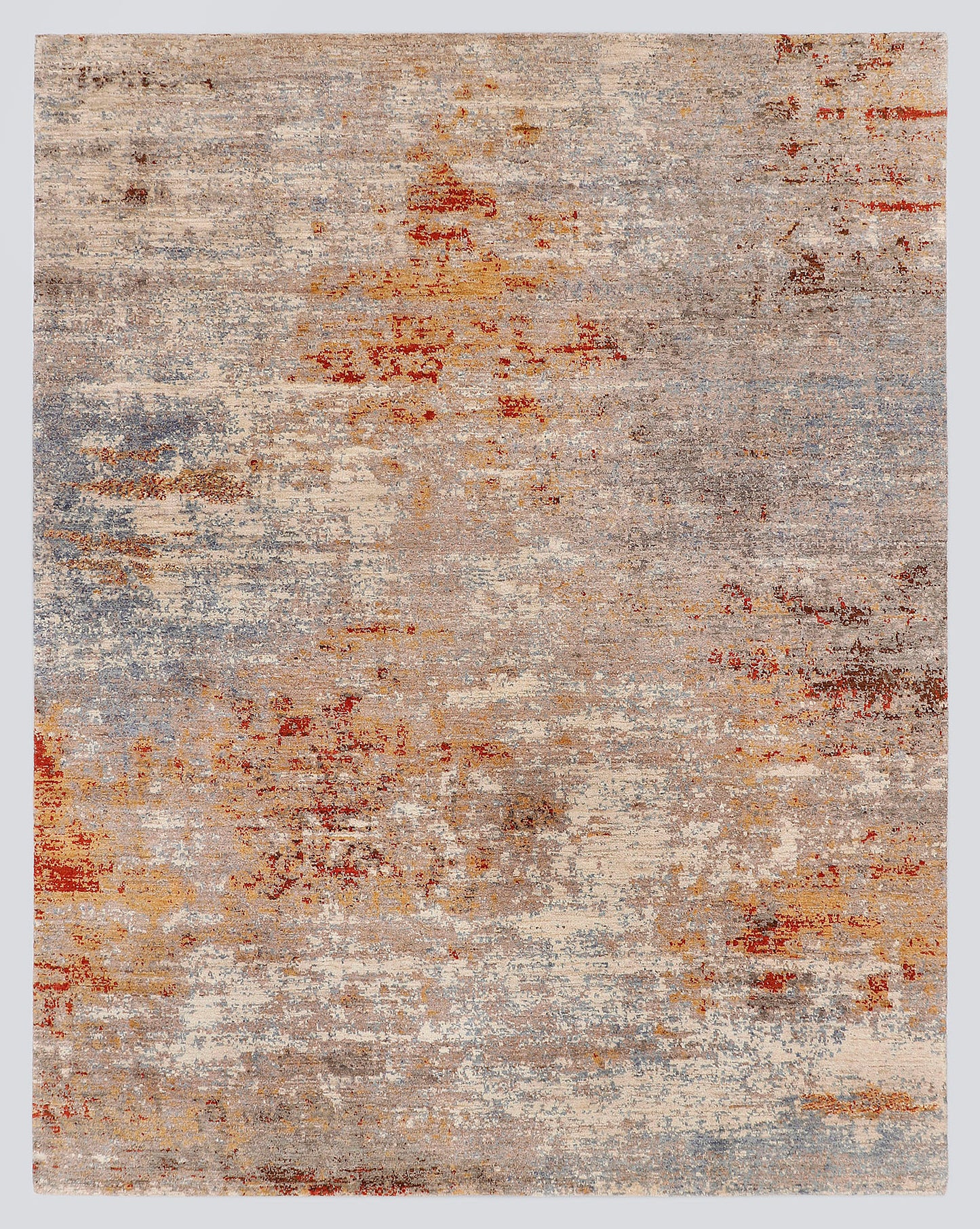 A full view of a modern, pure abstract hand-knotted rug featuring sweeping, painterly washes of slate blue and burnt sienna over a luminous cream foundation.