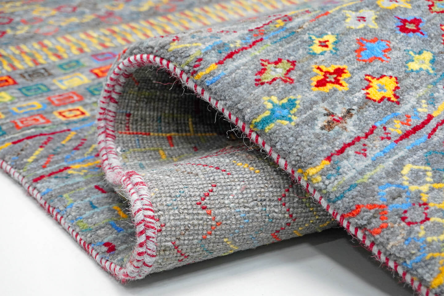 Close-up of the plush silver wool pile and detailed heritage Tariqa levels of the Silver Tariqa rug