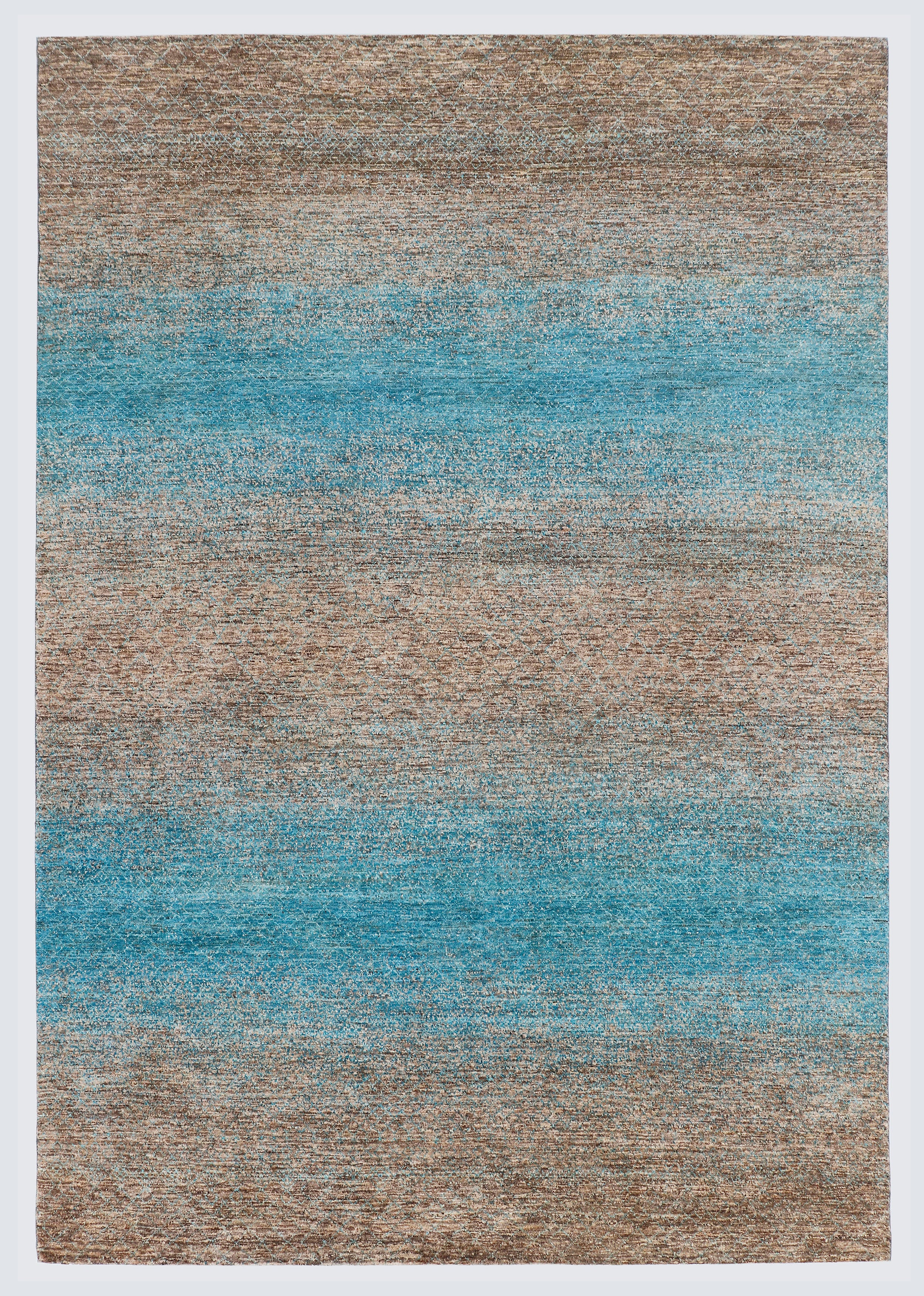 A full architectural view of a large hand-knotted Aatish Gabbeh rug featuring horizontal sea-blue bands over a natural, textured un-dyed wool base.