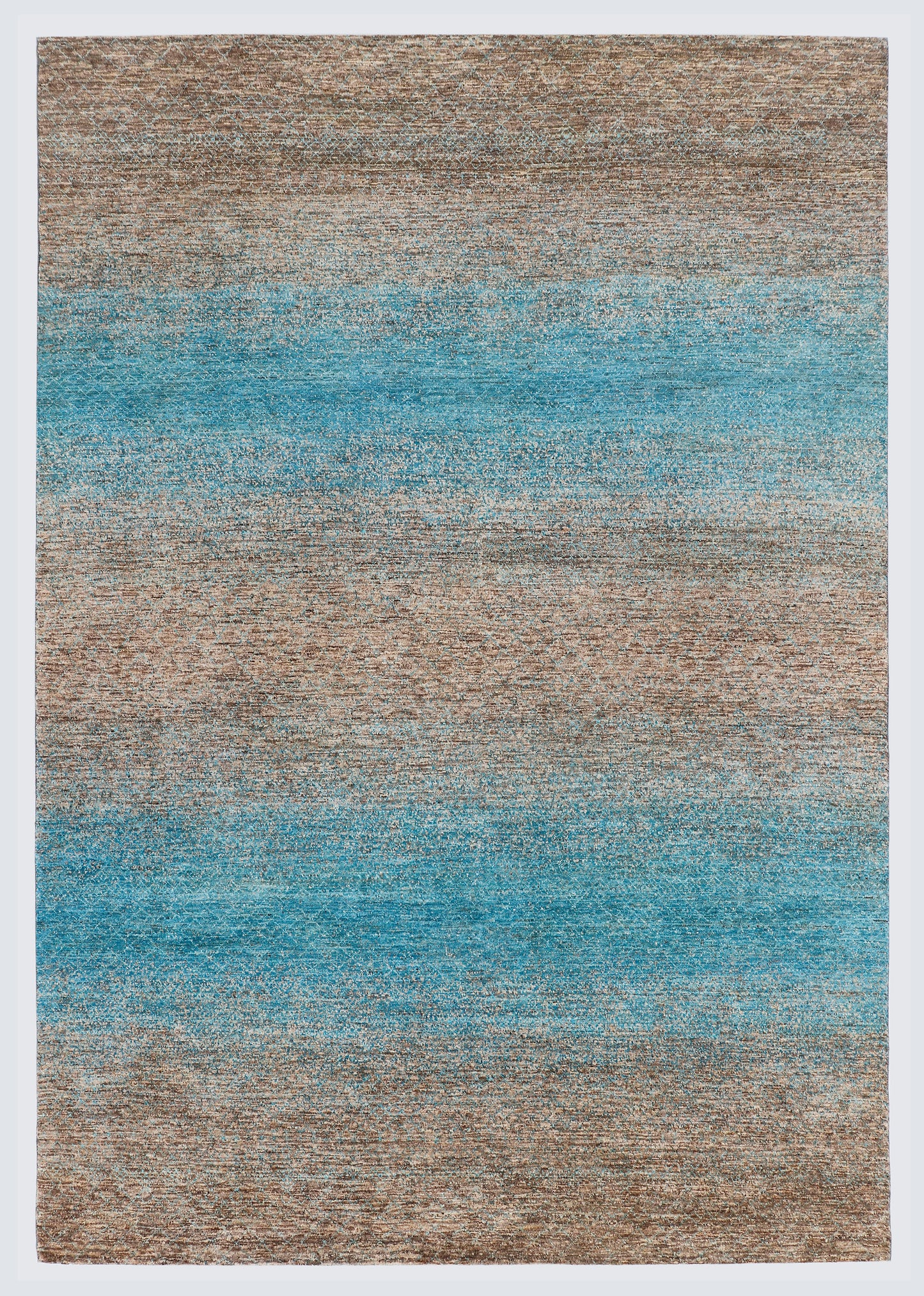 A full architectural view of a large hand-knotted Aatish Gabbeh rug featuring horizontal sea-blue bands over a natural, textured un-dyed wool base.