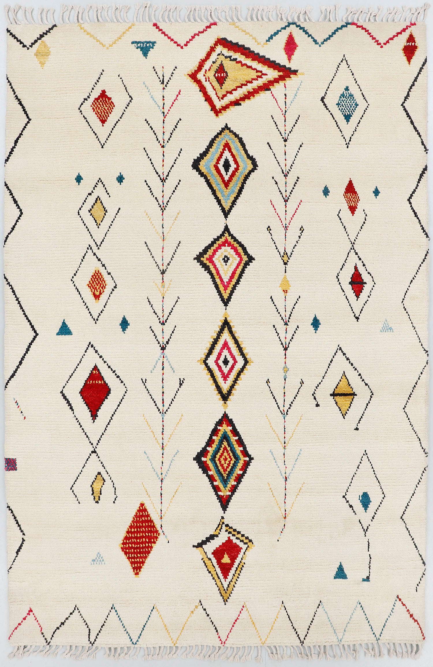 A full view of a hand-knotted, high-pile Moroccan style rug on a natural cream background, featuring a central vertical stack of colorful diamonds, flanked by delicate chevron vine motifs and framed by zigzag borders.